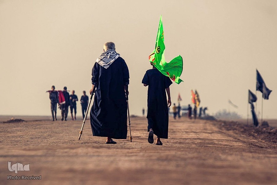A man with disabilities attend Arbaeen walk in September 2022.