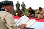 Il Corano al fronte contro l'isis + FOTO